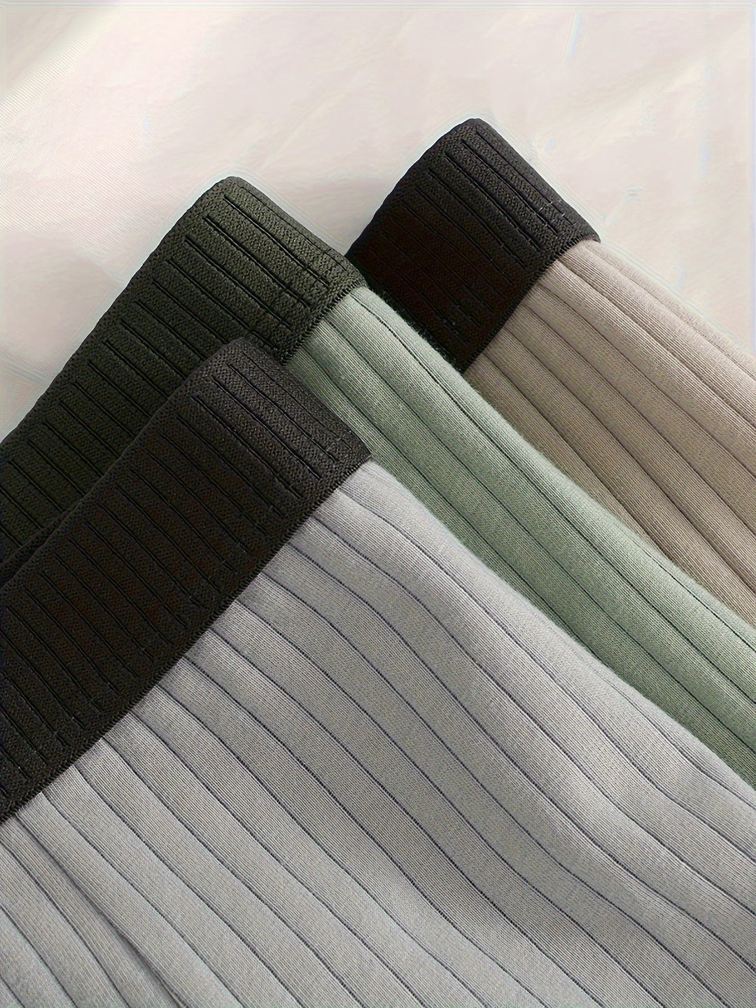 Display of men's intimates: a 6-pack of ribbed boxer briefs, designed for soft feel and lasting comfort.