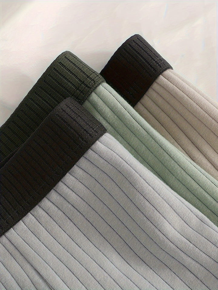 Display of men's intimates: a 6-pack of ribbed boxer briefs, designed for soft feel and lasting comfort.