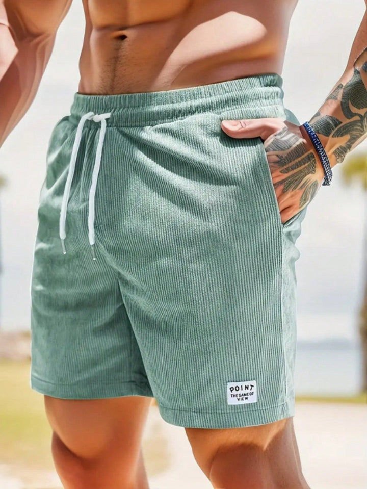 Ultra-comfortable men's ribbed drawstring shorts. Mid-thigh length, ideal for casual, lounge & summer style.