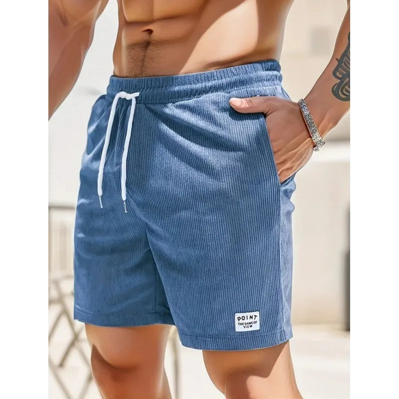 Men's ribbed drawstring swim shorts, quick-dry, relaxed fit for summer beachwear.