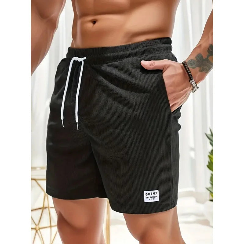 Stylish men's ribbed swim shorts with drawstring, perfect for poolside, beach, or vacation.