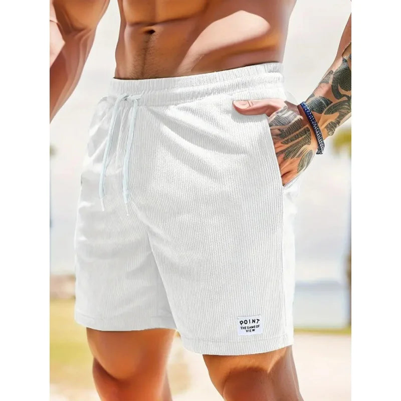 Comfortable men's ribbed swim shorts, quick-dry fabric, relaxed fit, ideal for summer.