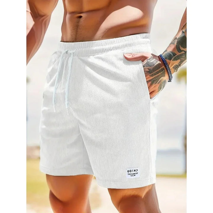 Comfortable men's ribbed swim shorts, quick-dry fabric, relaxed fit, ideal for summer.
