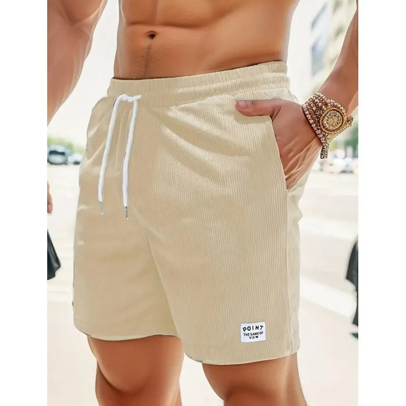 Men's ribbed drawstring swim shorts. Quick-dry, relaxed fit beachwear for summer vacation style.