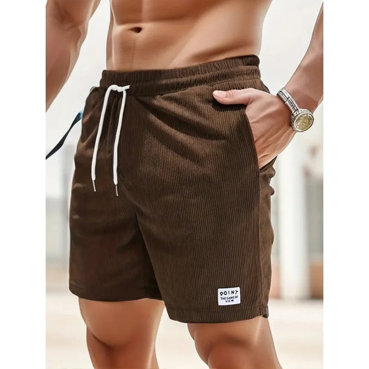 Summer men's ribbed swim shorts. Drawstring waist, quick-dry fabric, great for vacation & beach.