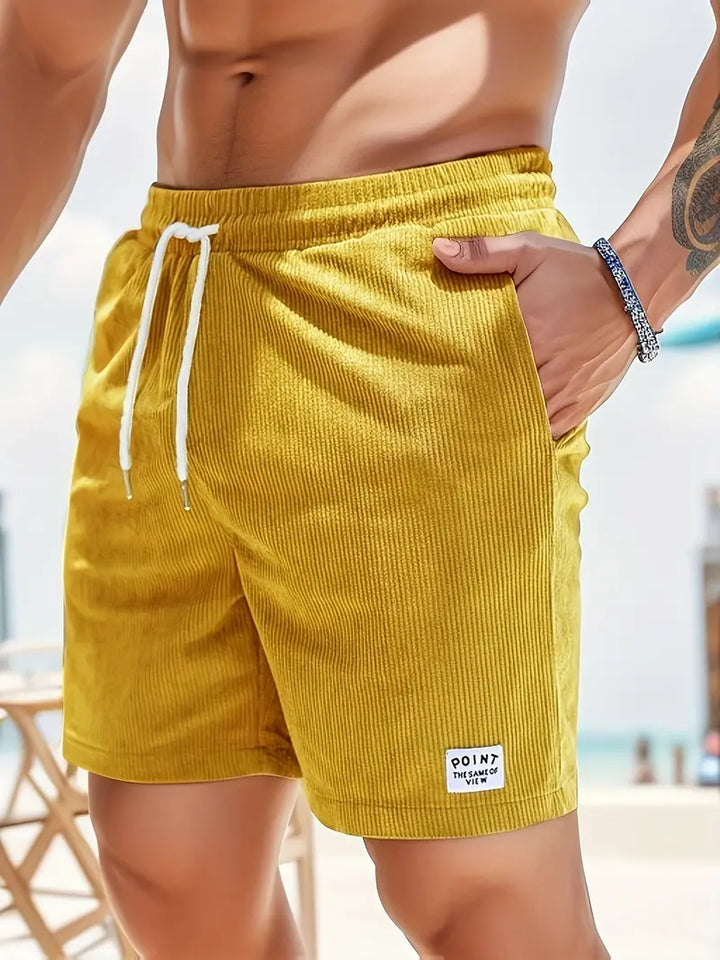Men's beachwear: ribbed quick-dry swim shorts for stylish summer vacation days.