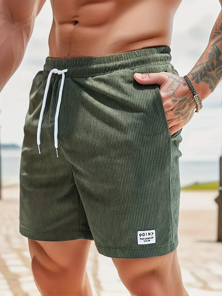 Stylish men's ribbed swim shorts, quick-dry fabric, ideal for summer vacation beachwear.