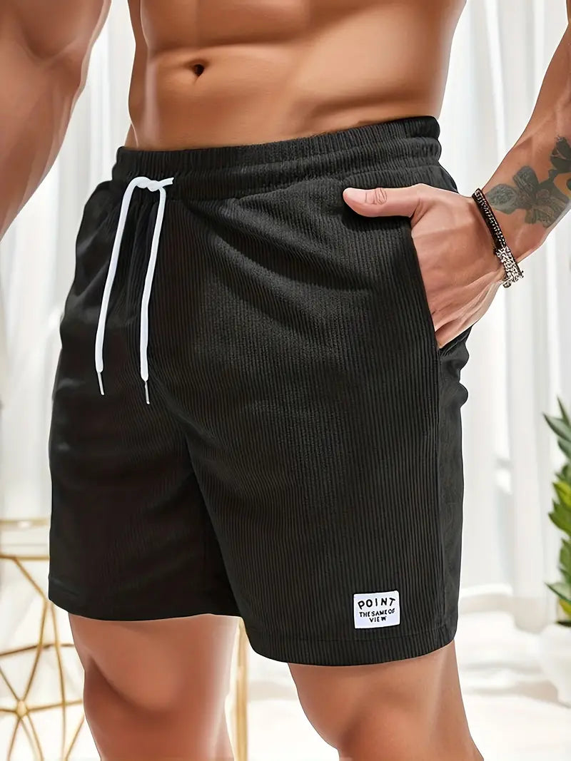 Fashion-forward men's ribbed swim shorts, quick-dry, ideal for casual summer style.