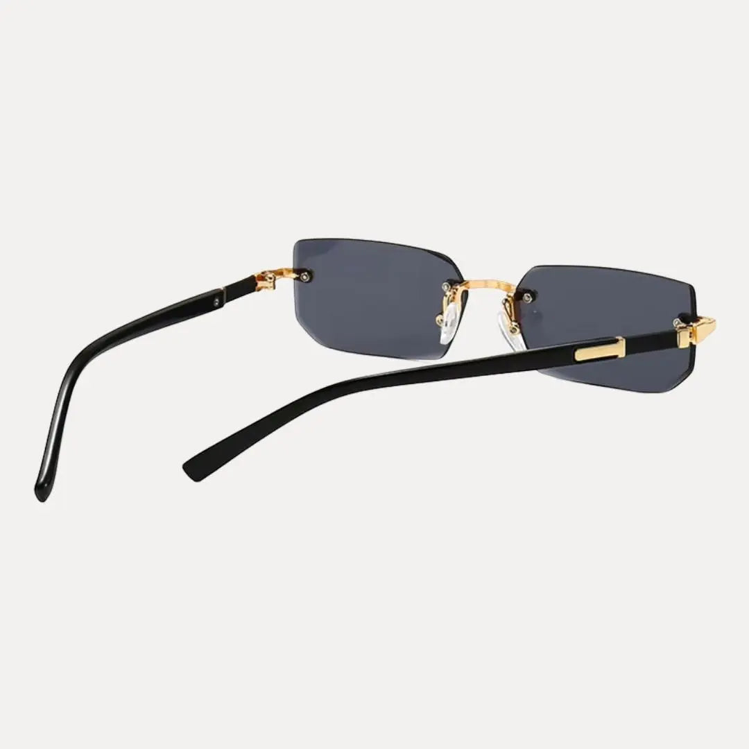 Sleek men's rimless rectangular sunglasses featuring a sophisticated gold metal frame. Ideal men's eyewear.