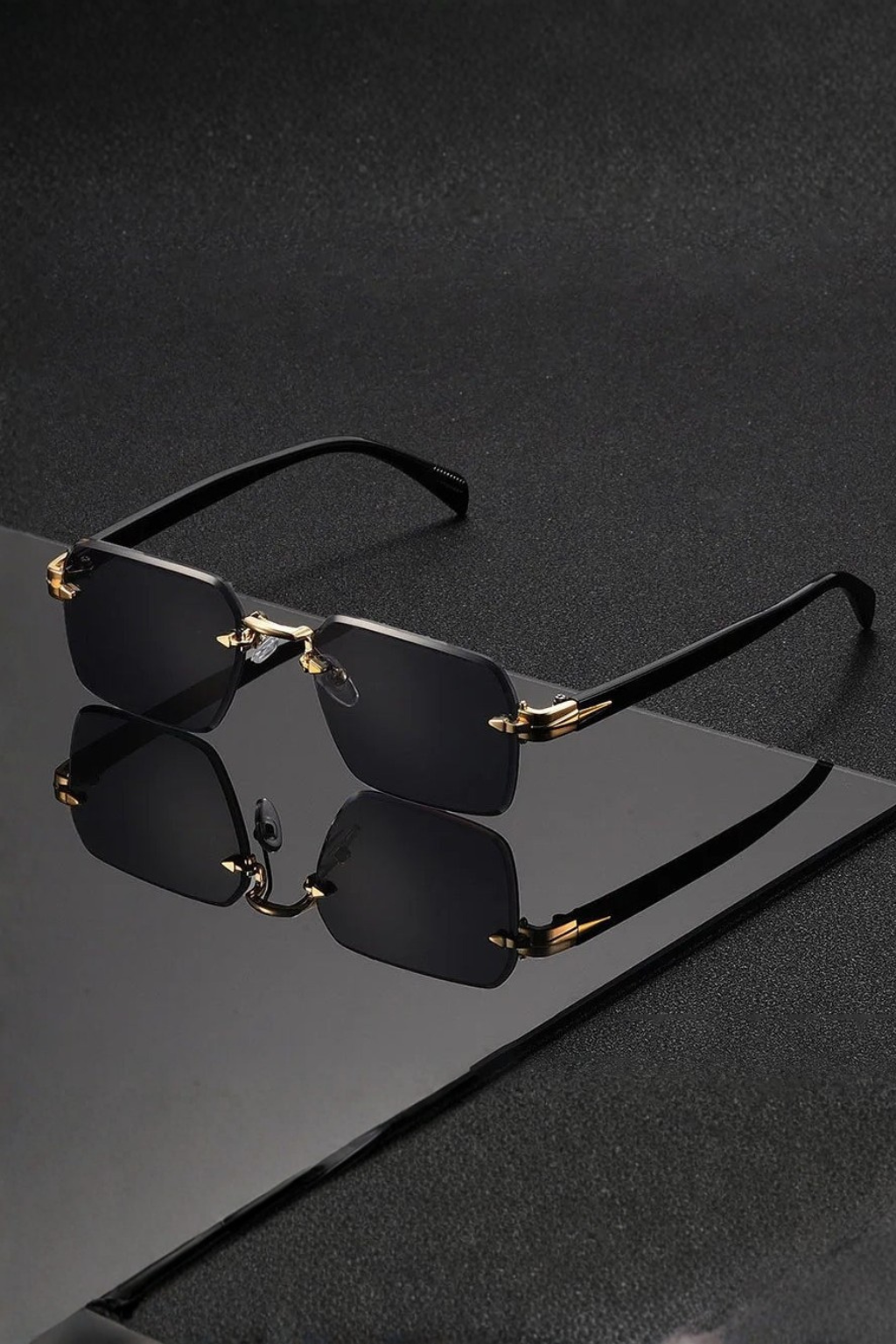 Men's rimless sunglasses. Gold bridge, gradient tinted lenses. Modern and essential stylish eyewear accessory.