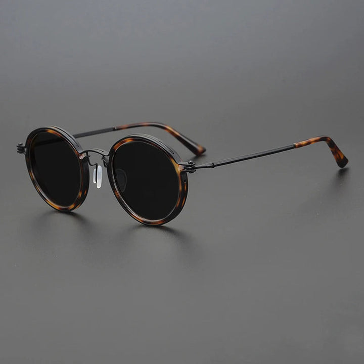 Polarized men's round sunglasses with vintage metal frame for superior anti-glare vision.
