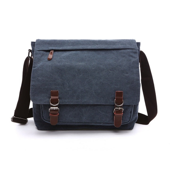 Rugged men's canvas crossbody shoulder bag, perfect for daily essentials & travel, featuring an adjustable strap.