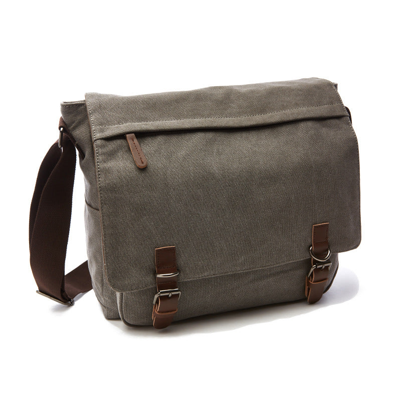 Stylish men's rugged canvas shoulder bag with adjustable strap for daily essentials and travel.
