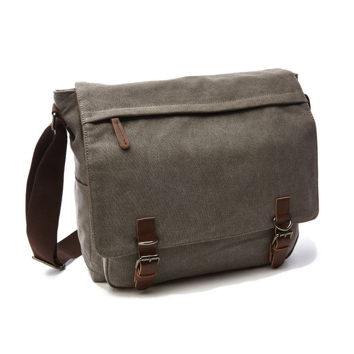 Stylish men's rugged canvas shoulder bag with adjustable strap for daily essentials and travel.