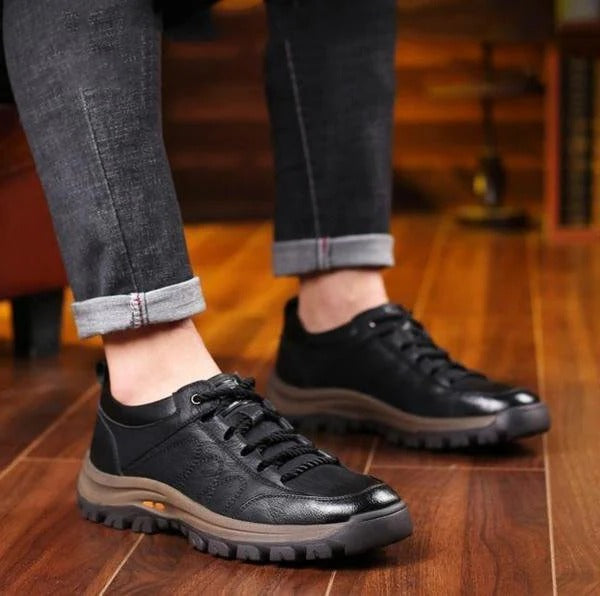 Men's rugged black low top lace-up shoes, providing comfortable, durable casual footwear for everyday.