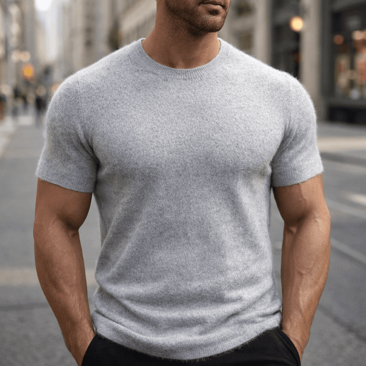 Stylish men's crew neck knitted t-shirt with short sleeves. Ideal for modern smart casual fashion.