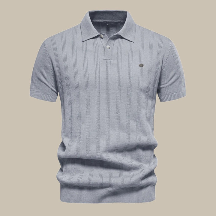 Stylish men's short sleeve knit polo, a classic top for smart-casual events and modern men's fashion.