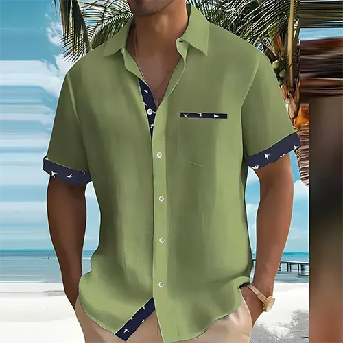 Men's short sleeve summer shirt in a vibrant blue. Stylish, breathable & comfortable for warm weather & vacation wear.
