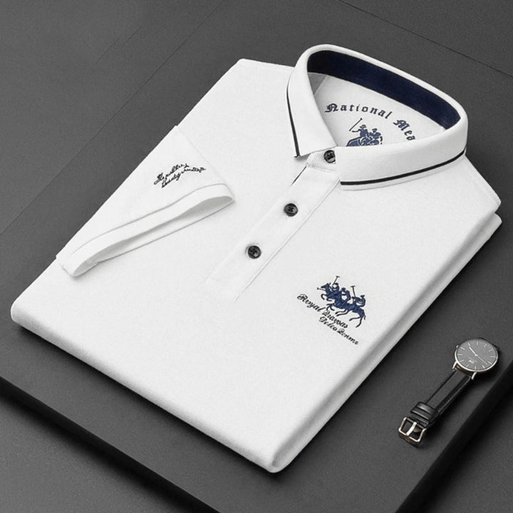White short-sleeve men's polo top with elegant tipped collar & embroidered logo, versatile smart casual.