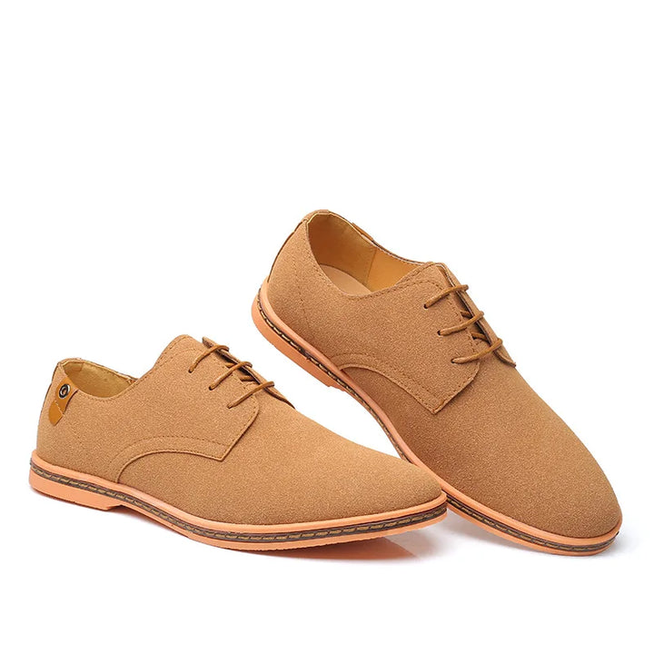 Polished black men's Oxford dress shoes, ideal for formal events, evening wear, and office attire.