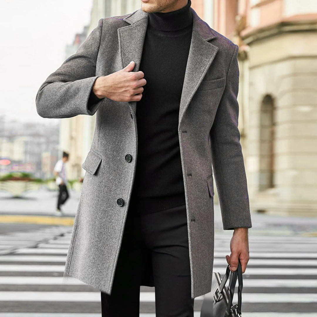 Men's single-breasted long overcoat, providing stylish warmth for winter and cold weather. Perfect outerwear.