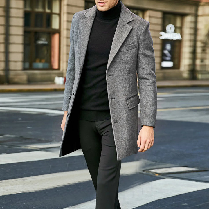 Fashionable men's long overcoat, single-breasted design, offering a sophisticated and warm winter outerwear option.