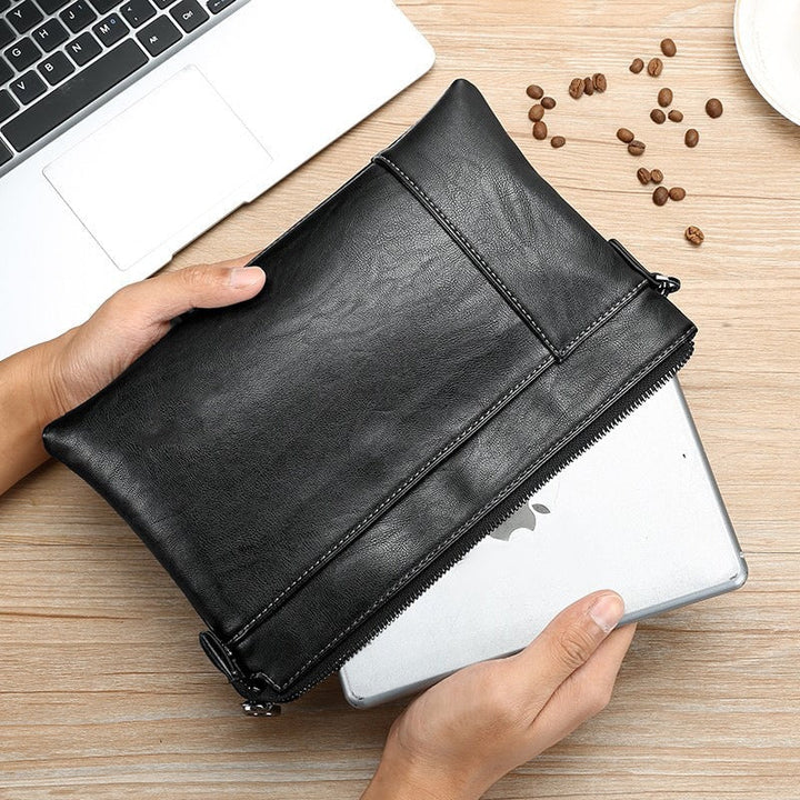 Black leather men's wristlet clutch, sleek design, an ideal everyday carry organizer and travel bag.