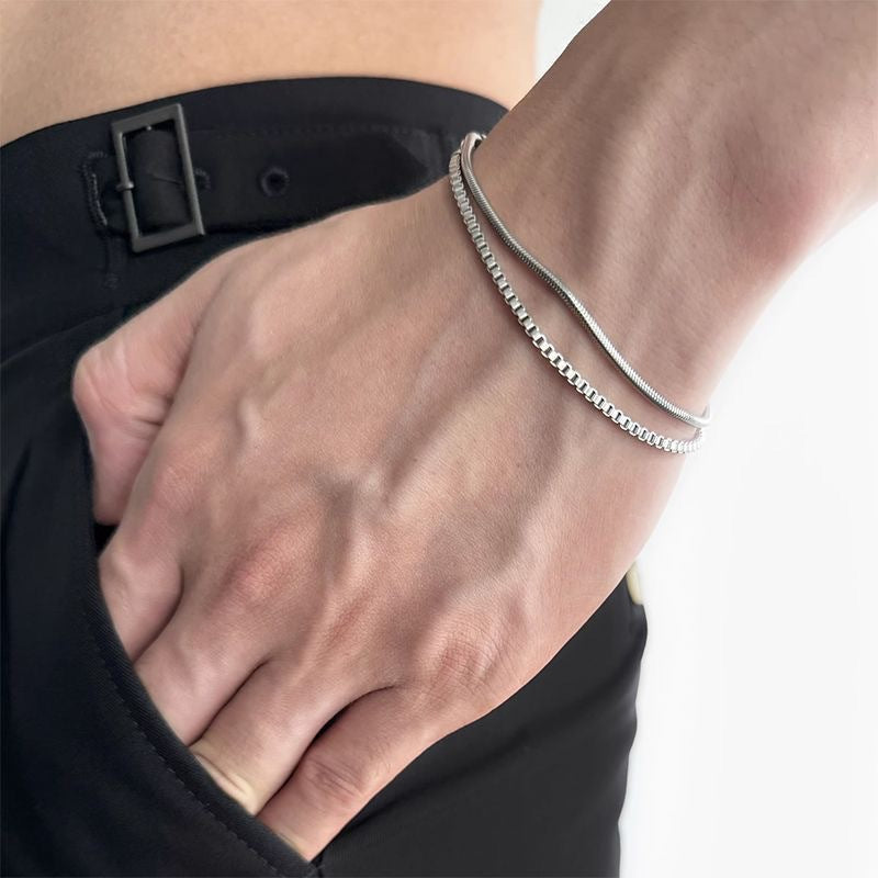 Men's sleek double-chain stainless steel bracelet, silver-tone, a modern and sophisticated piece of men's jewelry.