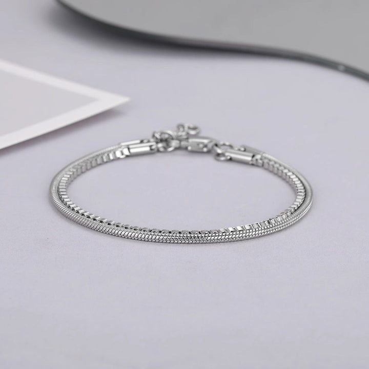 Modern men's double-chain stainless steel bracelet, sleek silver-tone design, ideal for everyday wear or as a gift.