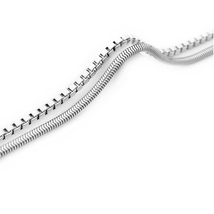 Durable stainless steel men's double-chain bracelet. Sleek silver-tone, adjustable, a versatile piece of men's modern jewelry.