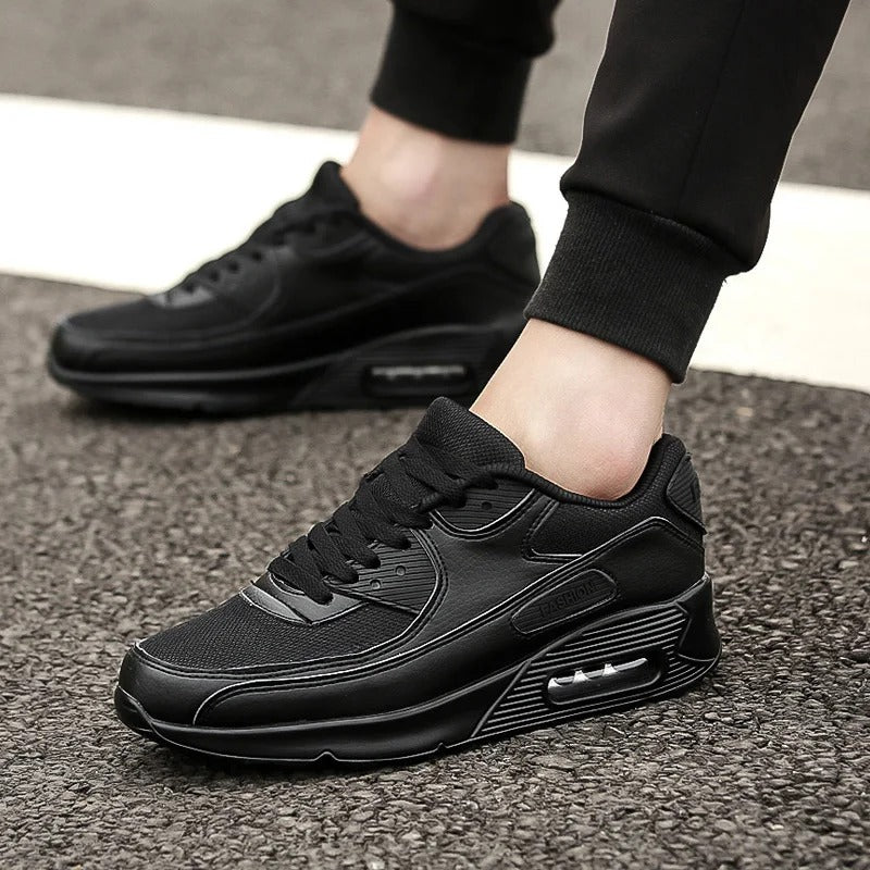 Men's sleek high-sole white sneakers for urban style. Comfortable lace-up casual footwear, perfect for streetwear.