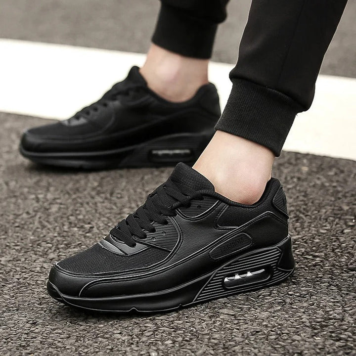 Men's sleek high-sole white sneakers for urban style. Comfortable lace-up casual footwear, perfect for streetwear.