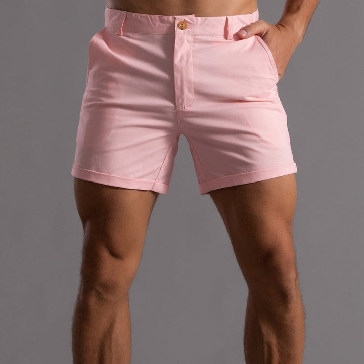 White men's tailored chino shorts, ideal for a crisp, stylish summer outfit. Sleek, comfortable and modern casual.