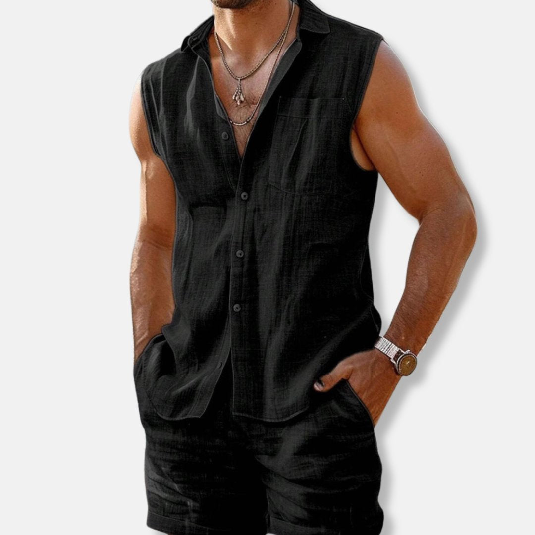 Stylish men's casual summer outfit: sleeveless button-down shirt and shorts for beach or resort.
