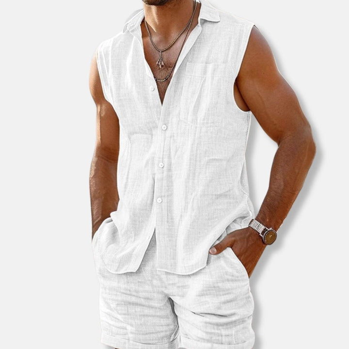 Modern men's sleeveless button-down and shorts co-ord set, great for a summer holiday look.