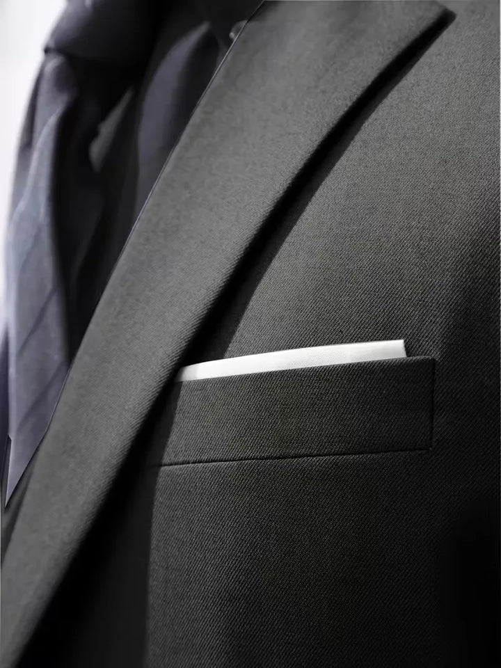 Distinctive men's slim fit 3-piece suit. Notched lapel jacket, vest, & trousers.