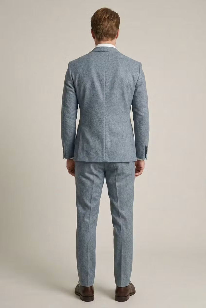 Professional men's slim-fit tailored suit in light grey. Great for modern office wear, weddings, or formal occasions.
