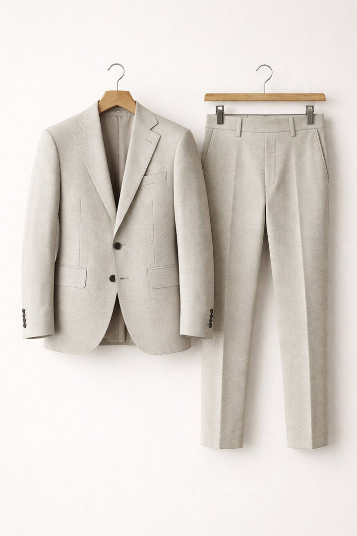Elegant men's two-piece black slim-fit suit. Ideal professional attire for weddings, business, and formal events.