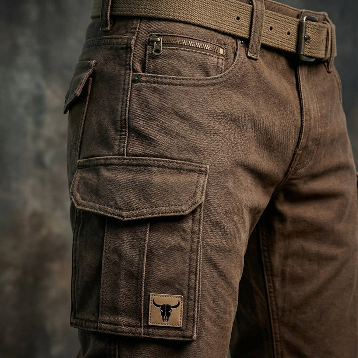 Men's slim fit brown cargo trousers with tapered leg & unique bull patch pockets, perfect for casual urban style.