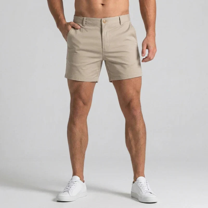 Men's slim fit chino shorts with tailored waist in a classic color, ideal for summer casual wear.
