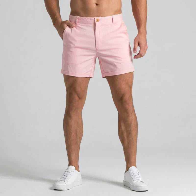 Front view of men's slim fit chino shorts, tailored waist detailing, perfect for warm weather style.