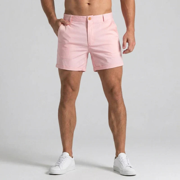 Front view of men's slim fit chino shorts, tailored waist detailing, perfect for warm weather style.