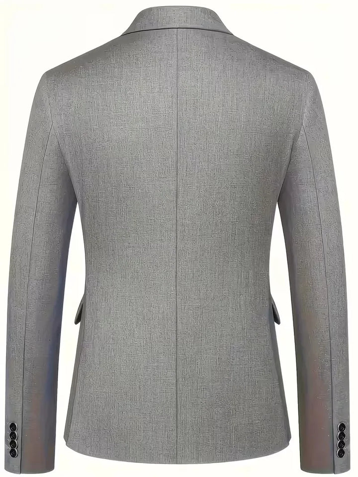 Elegant men's three-piece formal suit, double-breasted and slim fit for refined style.