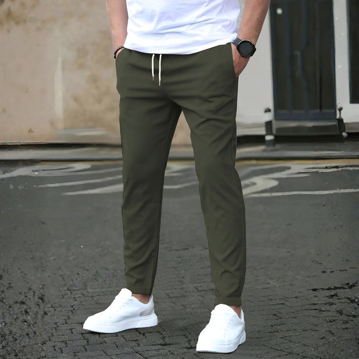Comfortable men's slim fit drawstring pants, a stylish choice for all-season casual wear.
