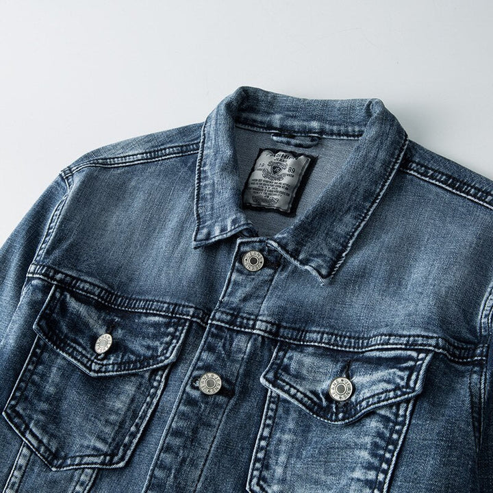 Stylish men's light blue slim fit denim jacket with biker style details, great for casual spring/autumn outfits.