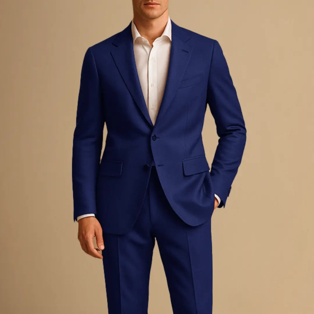 Stylish men's slim fit two-piece suit with tailored blazer. Lightweight fabric for weddings, formal events & business.
