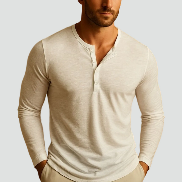 Men's slim fit long sleeve henley shirt, perfect for casual everyday wear. Features a stylish button neckline.