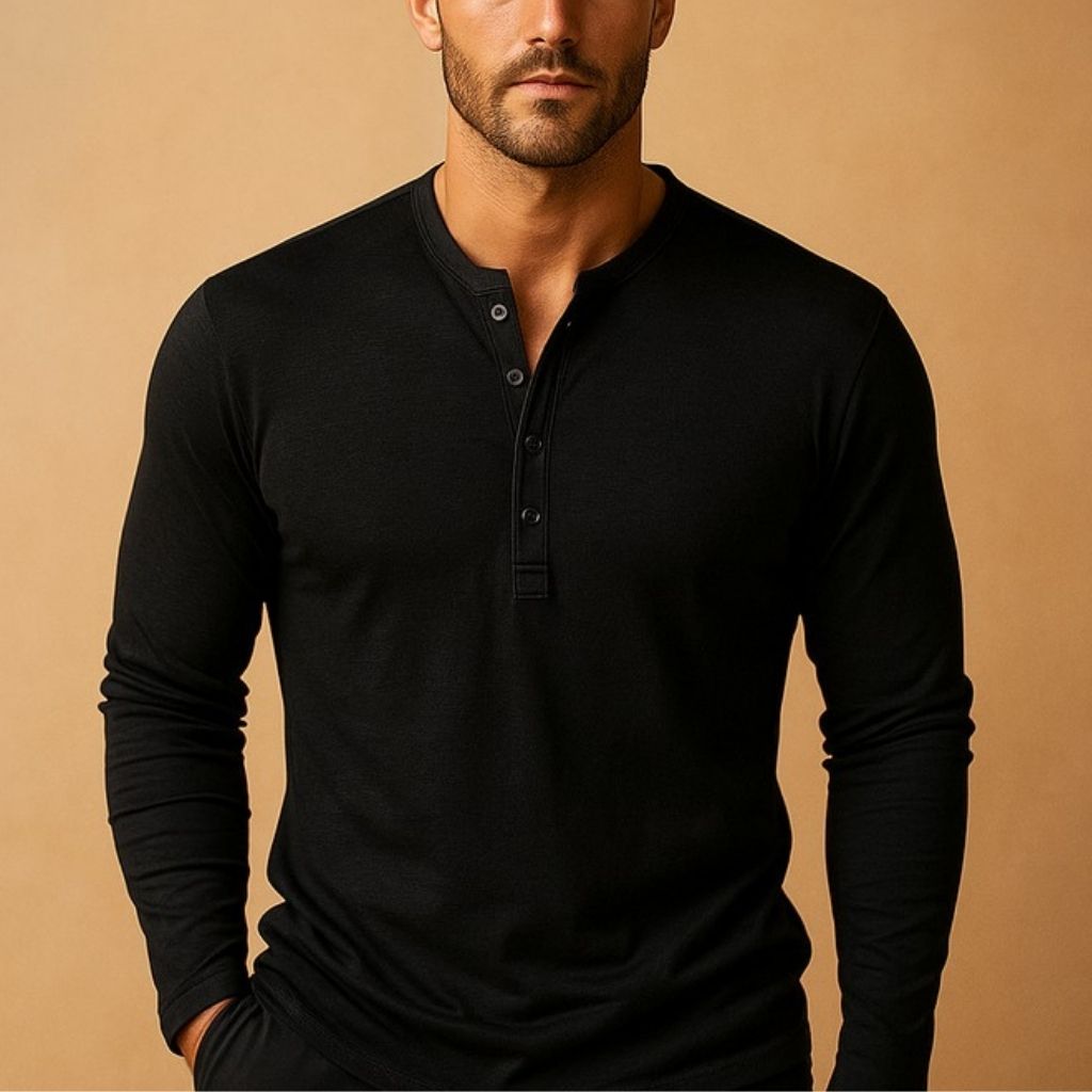 Comfortable men's long sleeve henley with a button neckline. Slim fit design for a sleek, modern look.