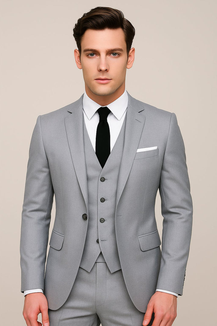Stylish navy slim-fit three-piece suit for men. Features a classic waistcoat, ideal for formal wear, business, or weddings.