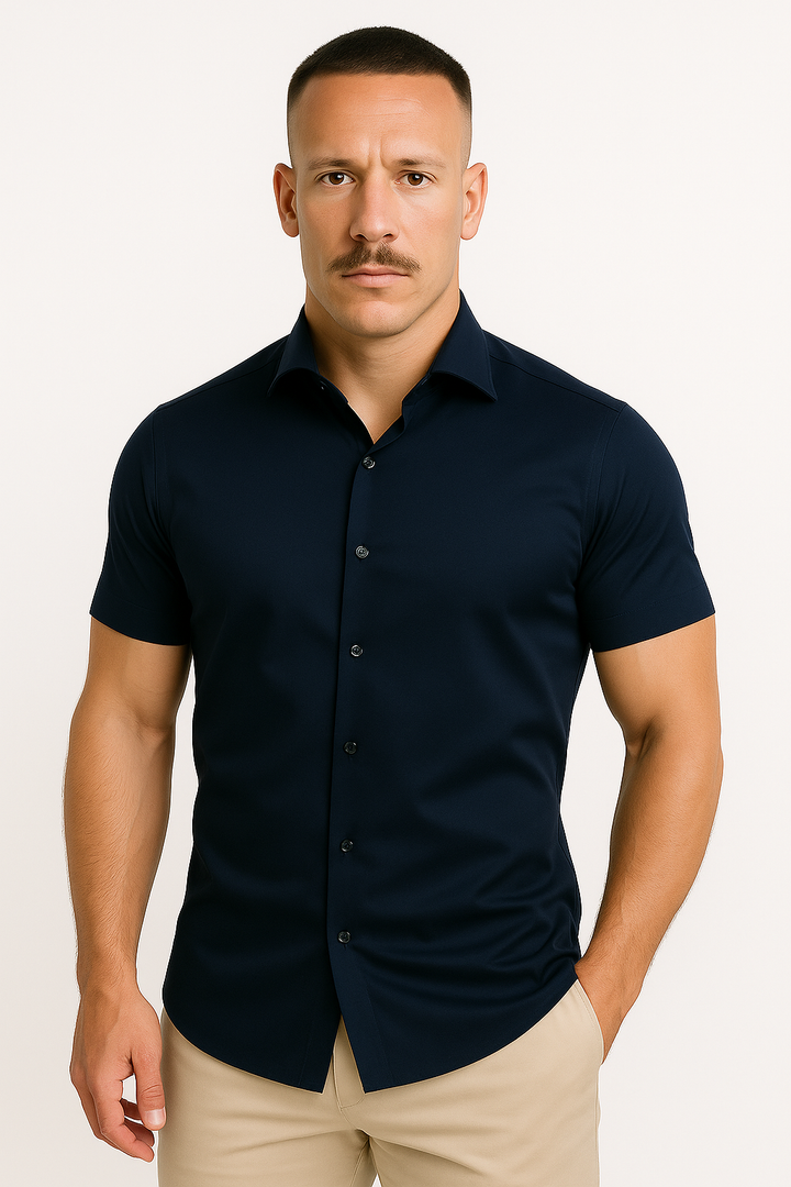 Man enjoying outdoor activity in a performance stretch tee, showcasing its comfortable and stylish athletic fit.